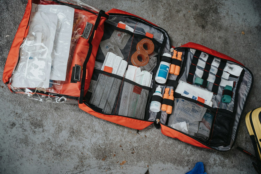 First aid kit bag, the kind of supplies useful for safely removing and treating a tick bite